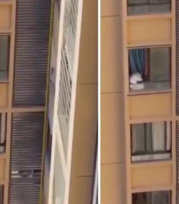 yuksek-katli-binada-tehlikeli-anlar-evli-asik-cunku-dusmemek-icin-camlardan-destek-aldi-XD1XblZF.jpg